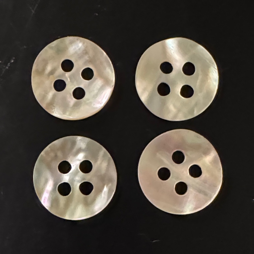 Set of Four Mother of Pearl buttons